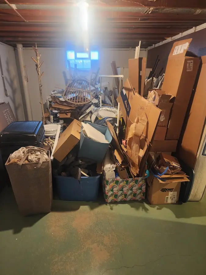 Roll-off dumpster container at job site for Construction Dumpster Rental in Three Oaks